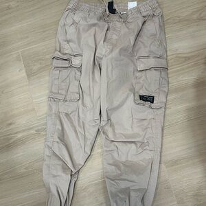 H&M khaki baggy cargo pants with stretchy waist and fitted cuffs